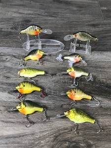 lot 417 image: Lot of 10 Fishing Lures Shaped Like a Sunfish, Crappie and a Bass