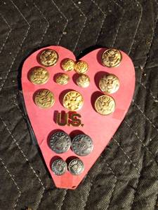 lot 188 image: Vintage Military buttons and a U.S. pin on a homemade valentine