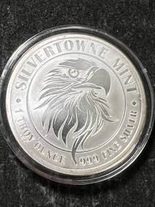 lot 38 image: 1 TROY OZ .999 FINE SILVER SILVERTOWNE MINT ROUND IN AIRTITE