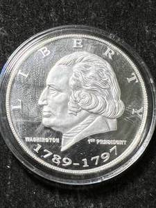lot 55 image: 1 TROY OZ .999 FINE SILVER GEORGE WASHINGTON ROUND IN AIRTITE