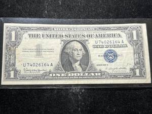 lot 71 image: 1957B US BLUE SEAL $1 SILVER CERTIFICATE