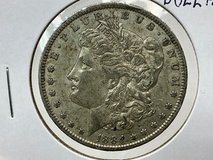 lot 11 image: 1884-O Morgan Dollar