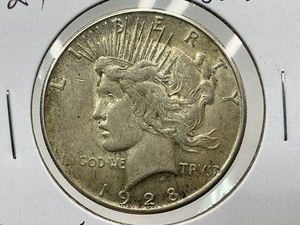 lot 24 image: 1928-S Peace Dollar