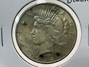 lot 61 image: 1934 Peace Dollar