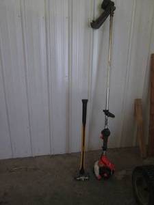 lot 13 image: Echo weed trimmer, sledgehammer and...