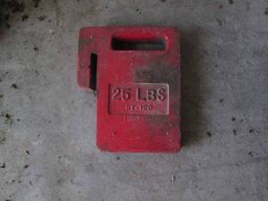lot 28 image: 25 lb tractor weight...