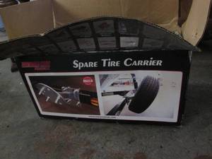 lot 36 image: New spare tire carrier...