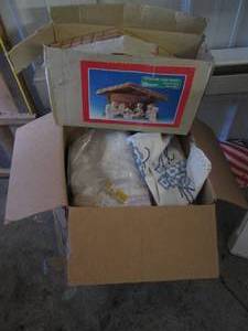 lot 50 image: Toboggan, linens and a nativity set...