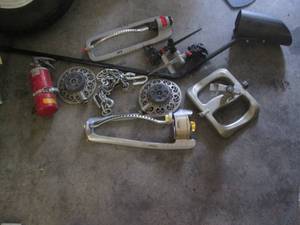 lot 61 image: Lot of metal sprinklers and yard it...