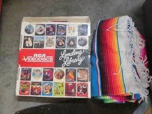 lot 166 image: Colorful blanket and video disc lib...