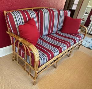 Vintage Bamboo Sofa with Red and Blue Striped Cushions