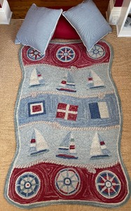 lot 29 image: Copper & Moo Nautical Rug with Three Coordinating Accent Pillows