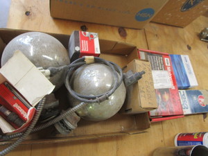 lot 147 image: Spark Plugs, Brake Pads, Light