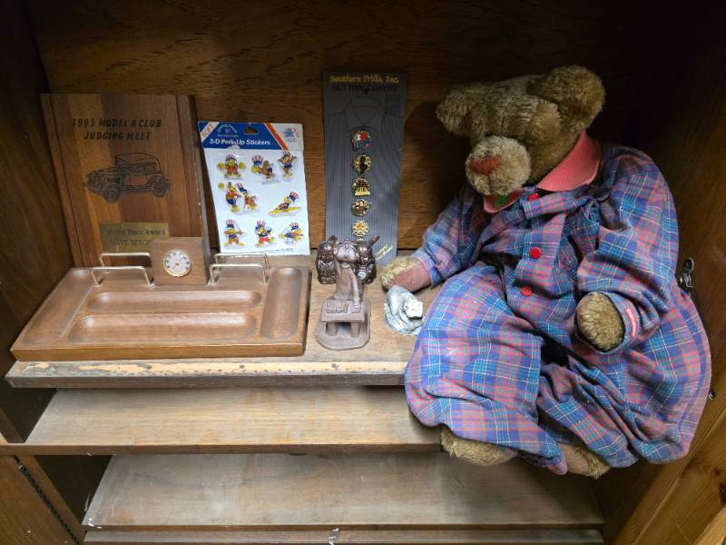 lot 11 image: VINTAGE MCM Dante Wood Jewelry Dresser Valet With thermometer, Vintage 1984 Los Angeles Olympics Sam the Eagle  3-D Stickers, Southern Frills Elvis button covers and More