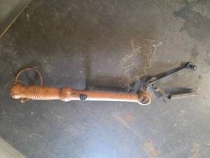 lot 59 image: Clay Pigeon thrower with a wooden handle