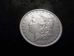 lot 10 image: 1884 Morgan Silver Dollar
