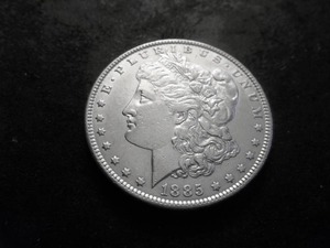 lot 11 image: 1885 Morgan Silver Dollar