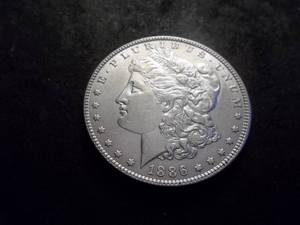 lot 12 image: 1886 Morgan Silver Dollar