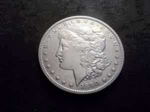 lot 17 image: 1890 O Morgan Silver Dollar