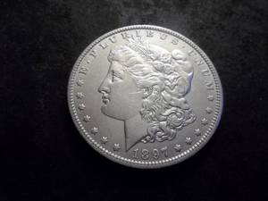 lot 24 image: 1897 O Morgan Silver Dollar