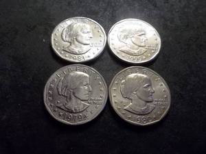 lot 54 image: 1979, 1980, 1981, 1999 Susan B. Anthony One Dollar Coins