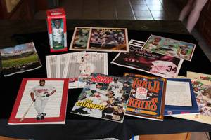 lot 13 image: Minnesota Twins Collectibles Puckett Bobble Head World Series Programs Puckett Weekend Giveaway and more