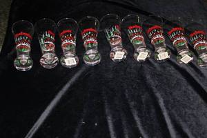 lot 28 image: 9 Budweiser Christmas Clydesdale Pilsner glasses