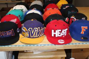 lot 66 image: Baseball Hat Collection Vikings Heat Pistons Gophers Wild Red Wings Flat Brim