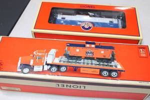lot 45 image: Lionel Truck with Caboose &  White Pass & Yukon Extended Vision Caboose