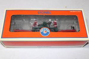 lot 123 image: Lionel Holiday Handcar Transport with Mr & Mrs. Claus Powered Hand Cart