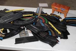 lot 136 image: Bin of Slot Car AFX Track and accessories Lap Counter, Controllers