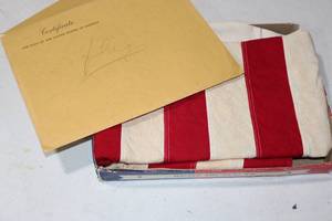 lot 157 image: Flag Flown over United States Capitol with Document to Hubert Humphrey
