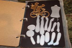 lot 109 image: 4 Books of Metal Die Cut Patterns  With Lots of People