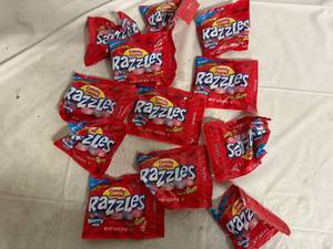 lot 192 image: 12 Bags of Candy Coated Razzlers