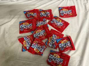 lot 205 image: 12 Bags of Candy Coated Razzlers
