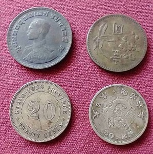 lot 64 image: (4) Vintage Asian Coins - (1) Silver