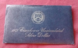 lot 85 image: 1973 Eisenhower Uncirculated Silver Dollar