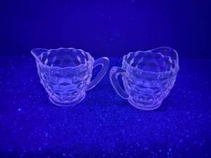 lot 116-J2025 image: Pair of Manganese Cut Crystal Creamers