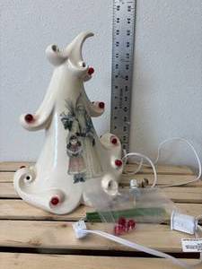 lot 149-J2025 image: Curved Cream-Colored Ceramic Christmas Tree by Mayco