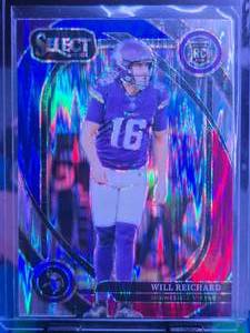 lot 159 image: WILL REICHARD 2024 PANINI SELECT CLUB LEVEL BLUE & RED PRIZM SHOCK & WILL REICHARD 2024 PANINI DONRUSS OPTIC RATED ROOKIE CARD