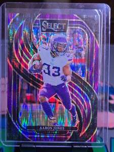 lot 352 image: AARON JONES 2024 PANINI SELECT PREMIER LEVEL PURPLE SHOCK PRIZM 009360 & AARON JONES 2024 PANINI ABSOLUTE FOOTBALL HOLO