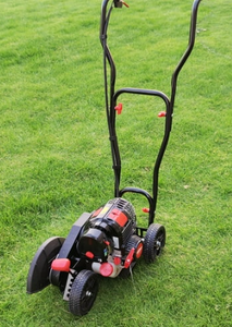 lot 26 image: Hyper Tough 31cc Gas 4-Cycle Gas Walk Behind Edger