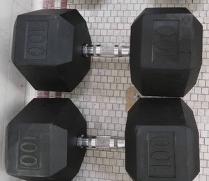 lot 8N image: PAIR OF 100 LB DUMB BELLS