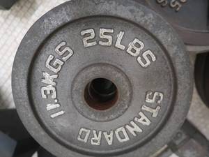 lot 137C image: 2 -25 LB BARBELL WEIGHTS