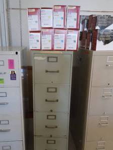 lot 203 image: METAL FILE CABINET AND PRINTER INK CARTRIDGES