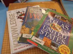 lot 220 image: OVERSIZED PAPERCUTTER AND BOOKS