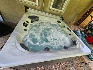 lot 1 image: 2024 Master Spas TS 7.25 Hot Tub  LED Lights, Graphite Cabinet, Orig. $12,499