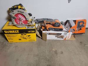 lot 35 image: Power Hand Tools  Rigid Belt Sander  Black and Decker Jigsaw  DeWalt Circular Saw