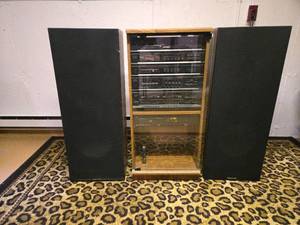 lot 32 image: Magnavox Stereo System with Speakers including a turntable, cassette deck, and CD changer