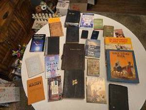 lot 47 image: Lot of Religious and Inspirational Books including Bible Symbols, Holy Bible, and More